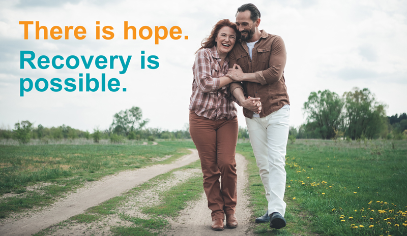 Happy couple walking. There is hope. Recovery is possible. Overdose Data to Action (OD2A)
